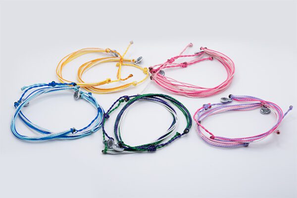 A group of bracelets that are all different colors.